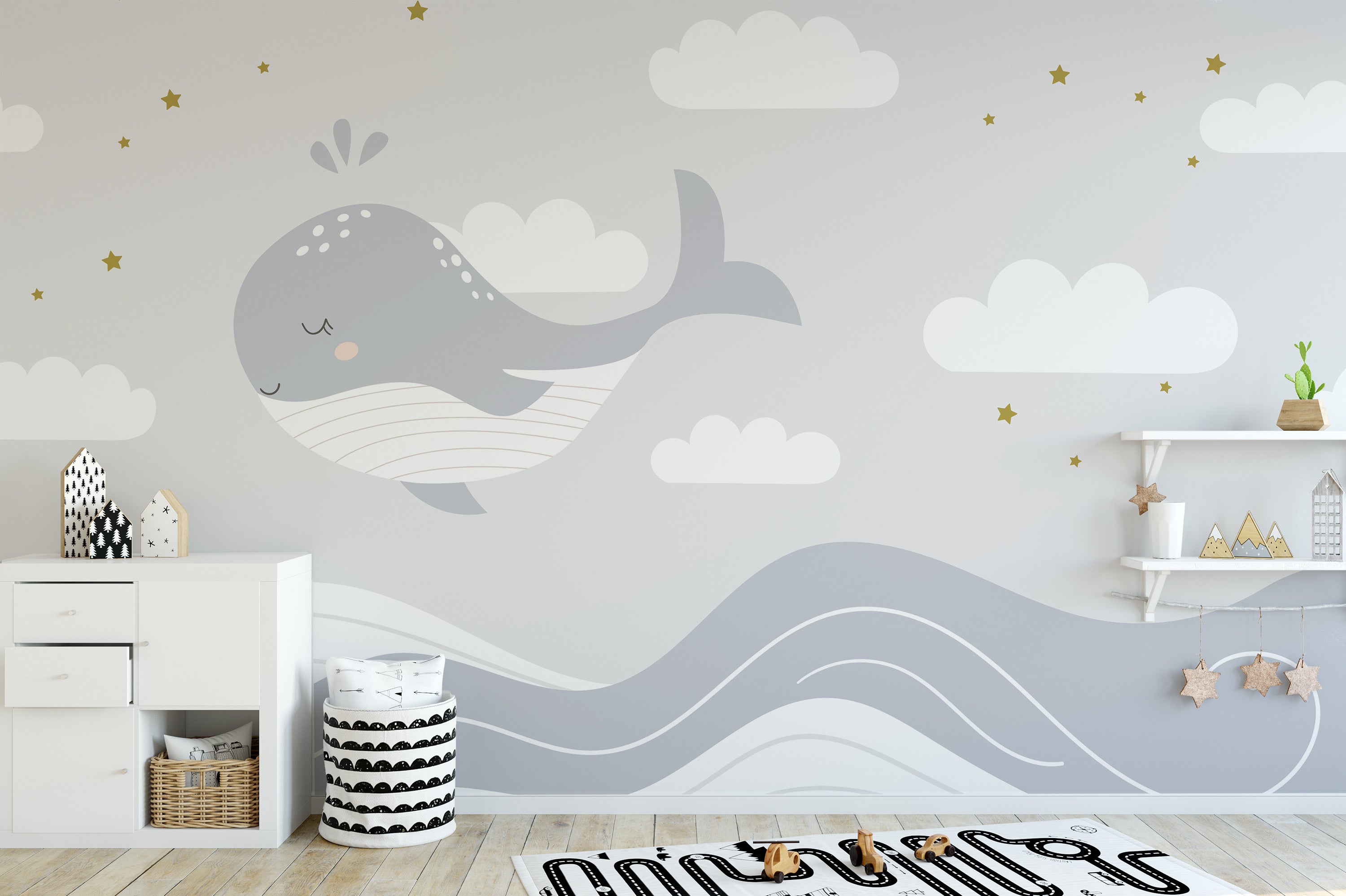 Smiling whale mural in soft ocean tones