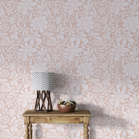 Delicate happy blooms pastel pink wallpaper with soft floral designs.
