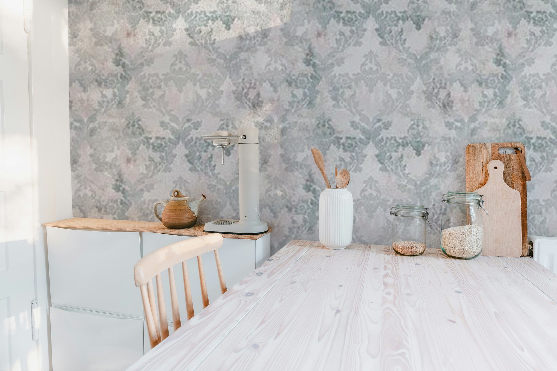 Home decor with elegant pink damask wallpaper
