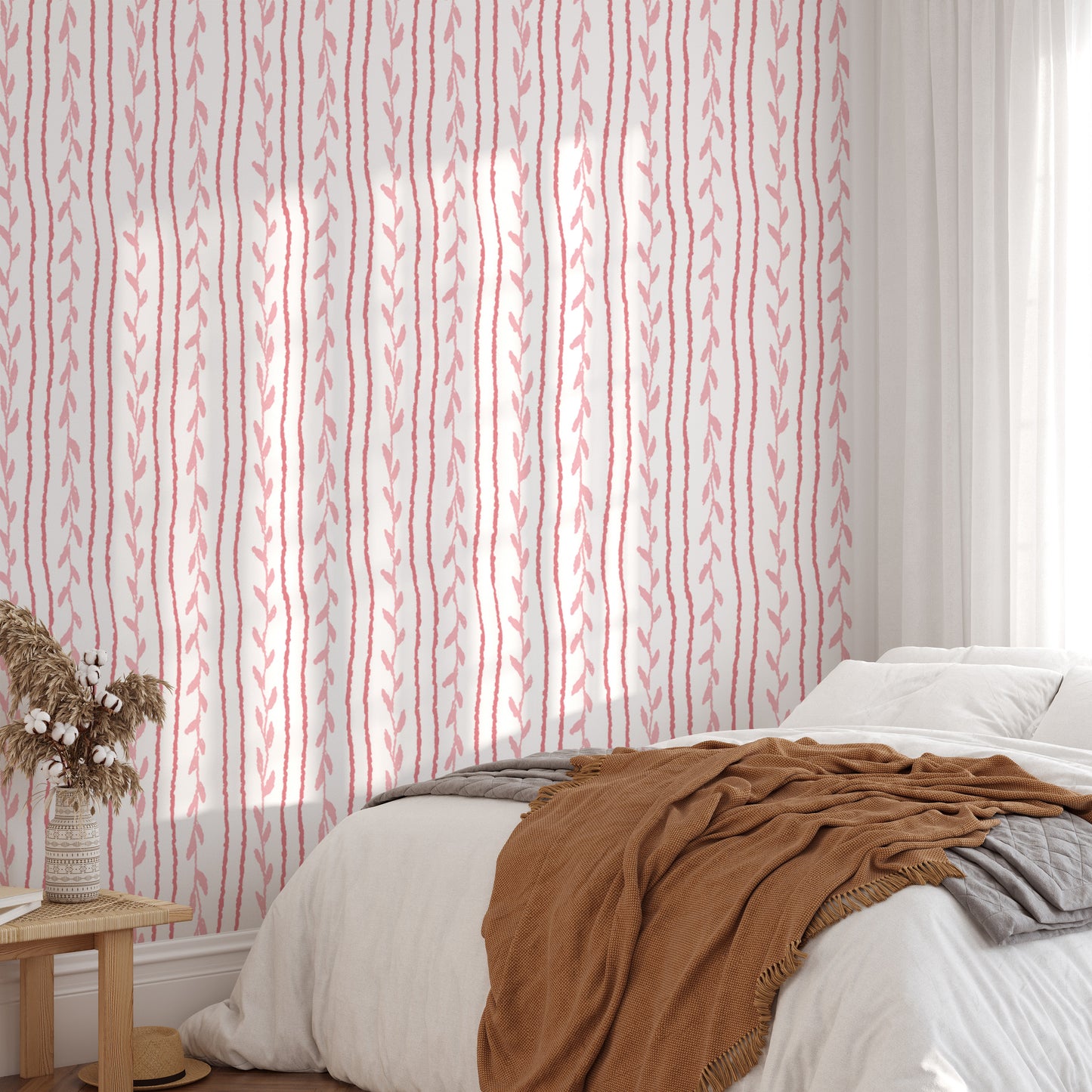 Delicate soft vines wallpaper in pink for a dreamy, floral touch.
