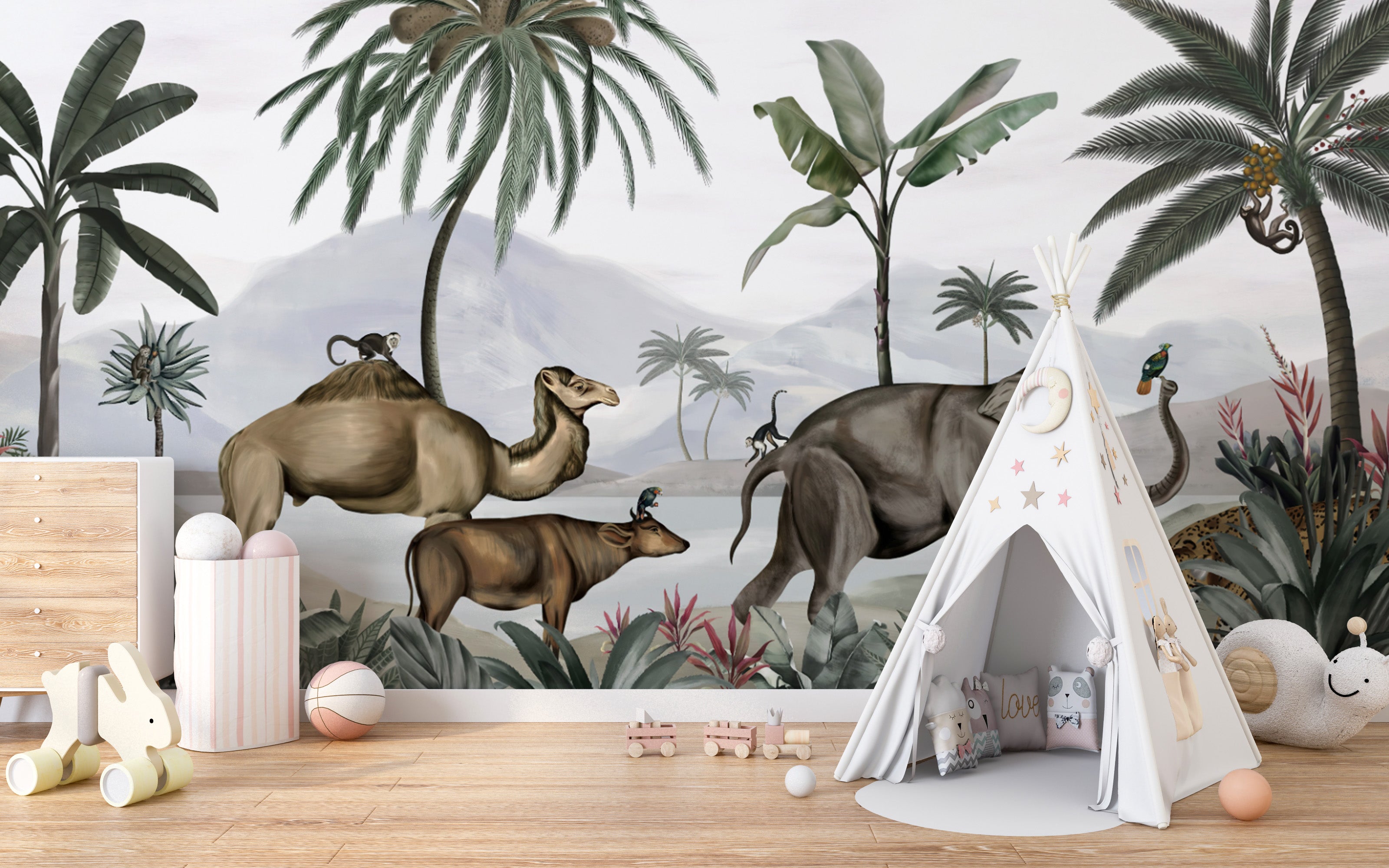 Tropical foliage and safari animals on a wall mural.
