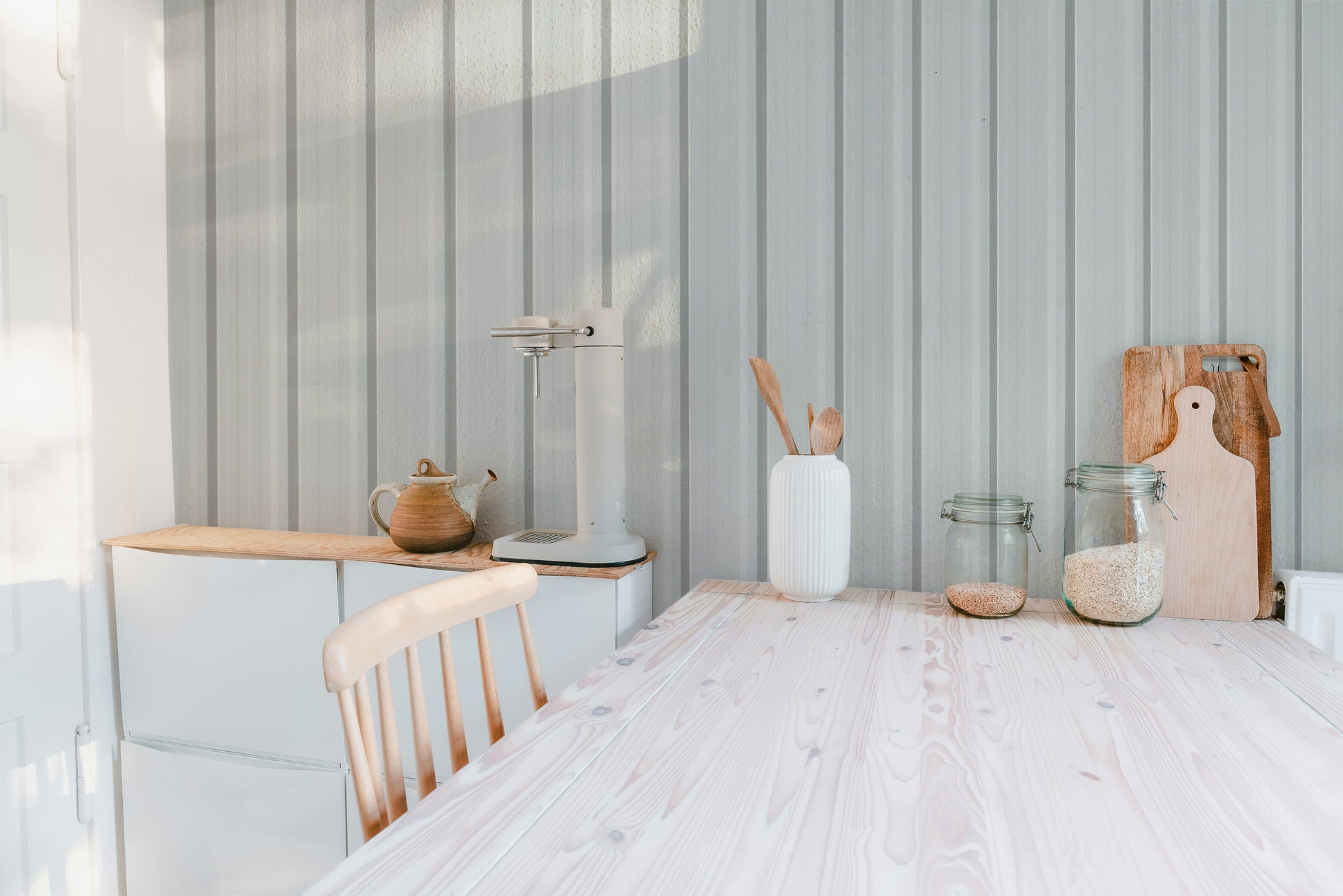 Modern wallpaper featuring white corrugated metal design
