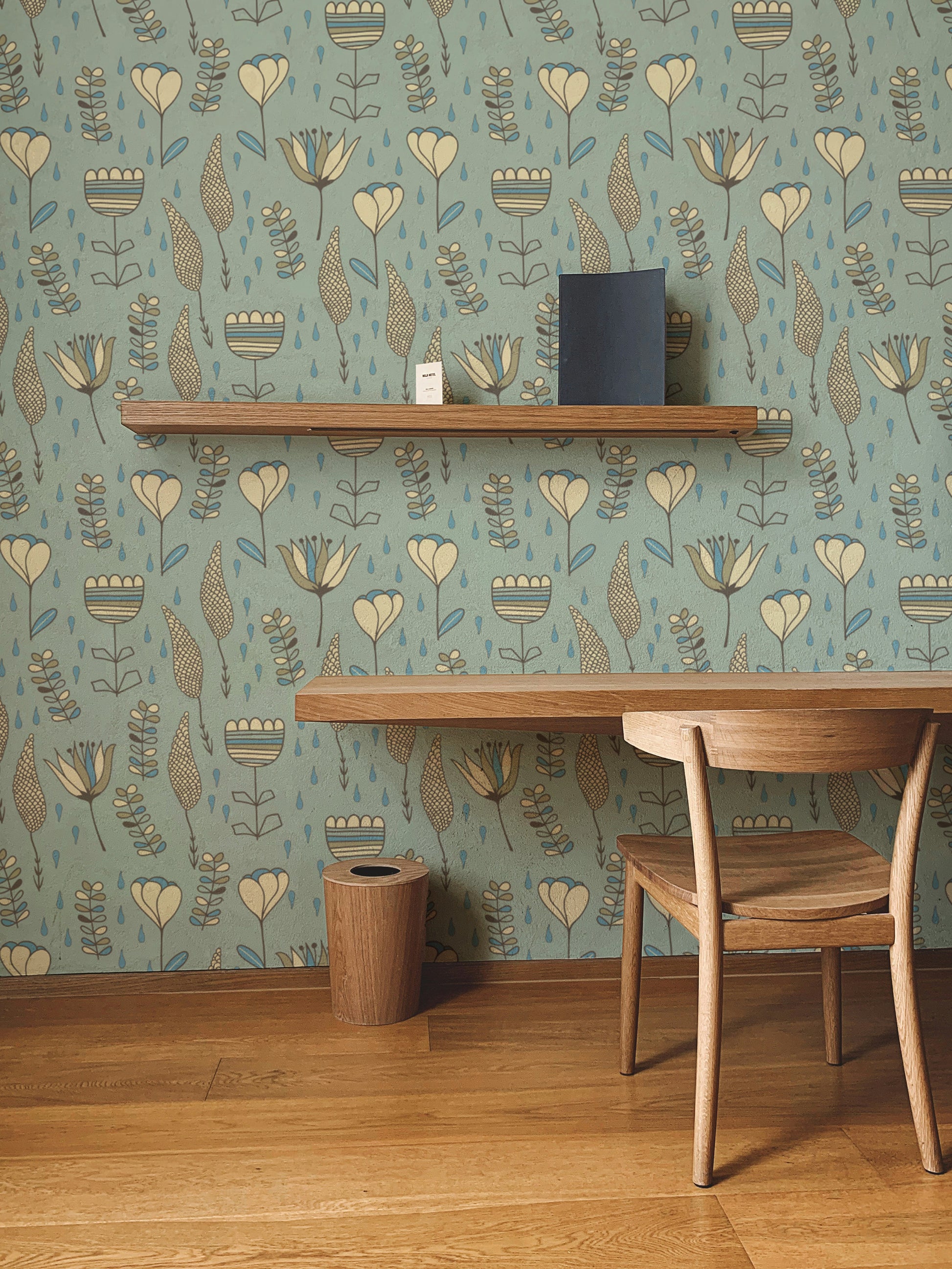 Modern naive blooms wallpaper featuring charming floral art.
