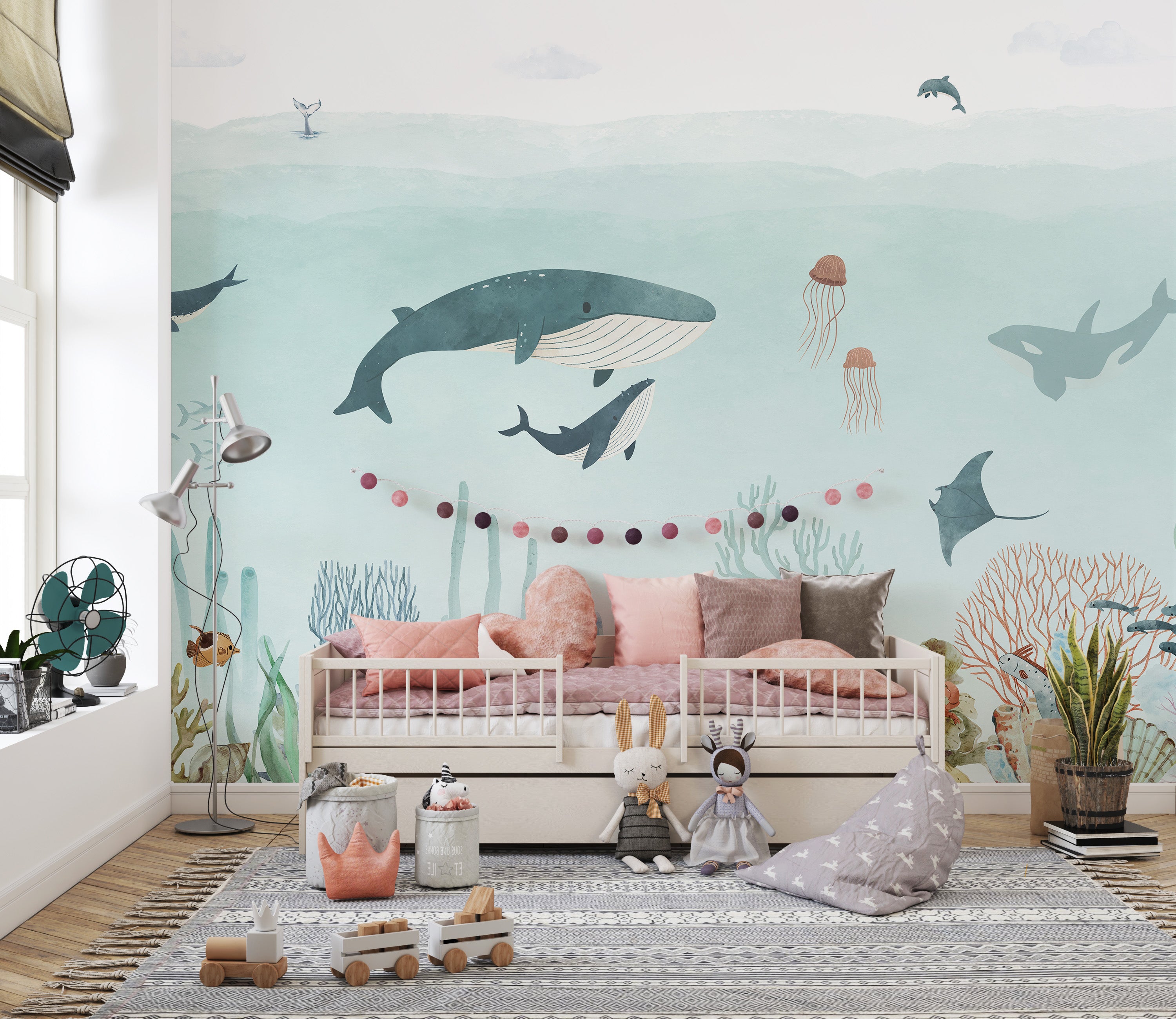 Whimsical sea-themed mural in blue tones