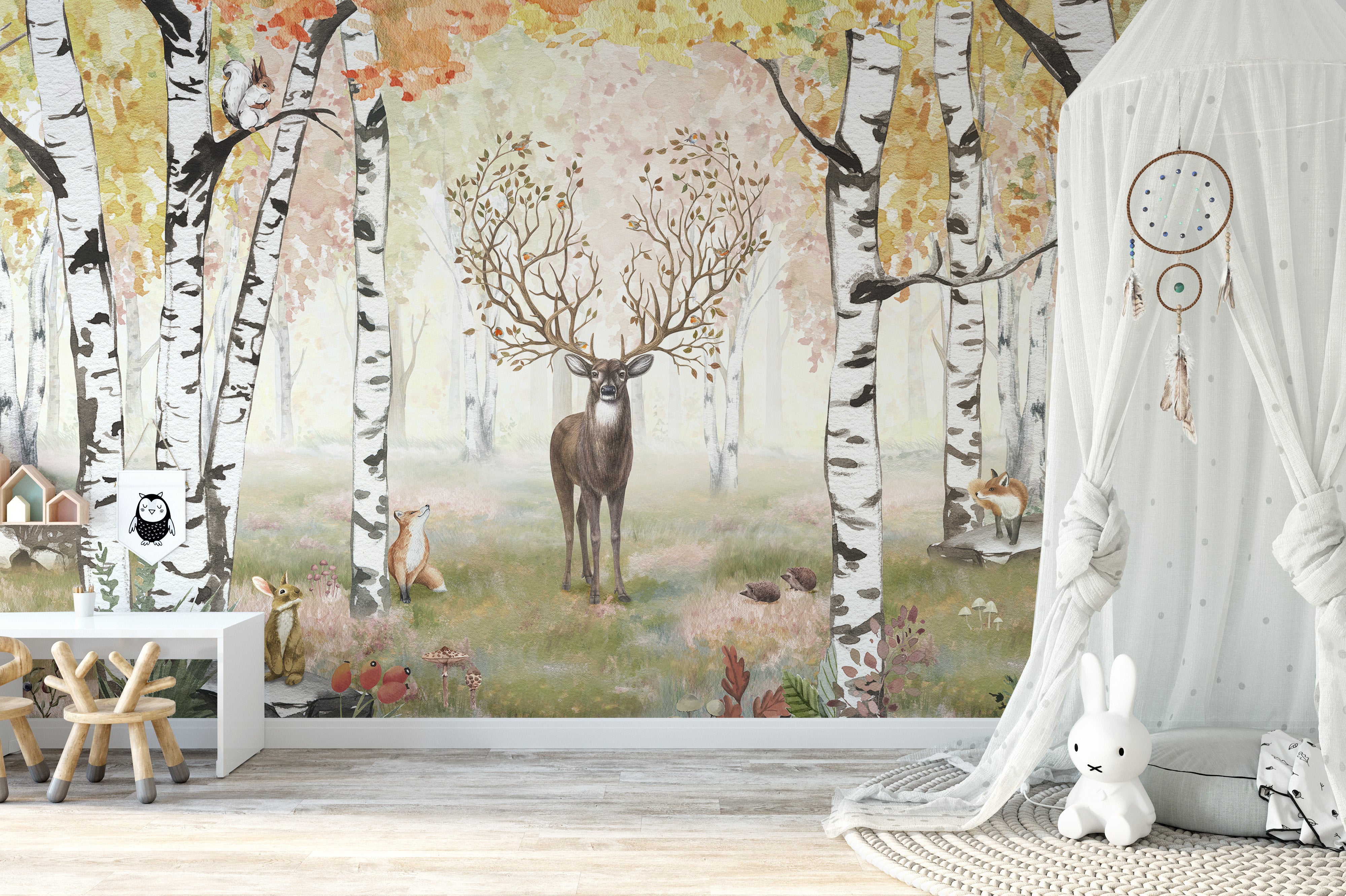 Woodland animals and a stag in a fall-themed forest.