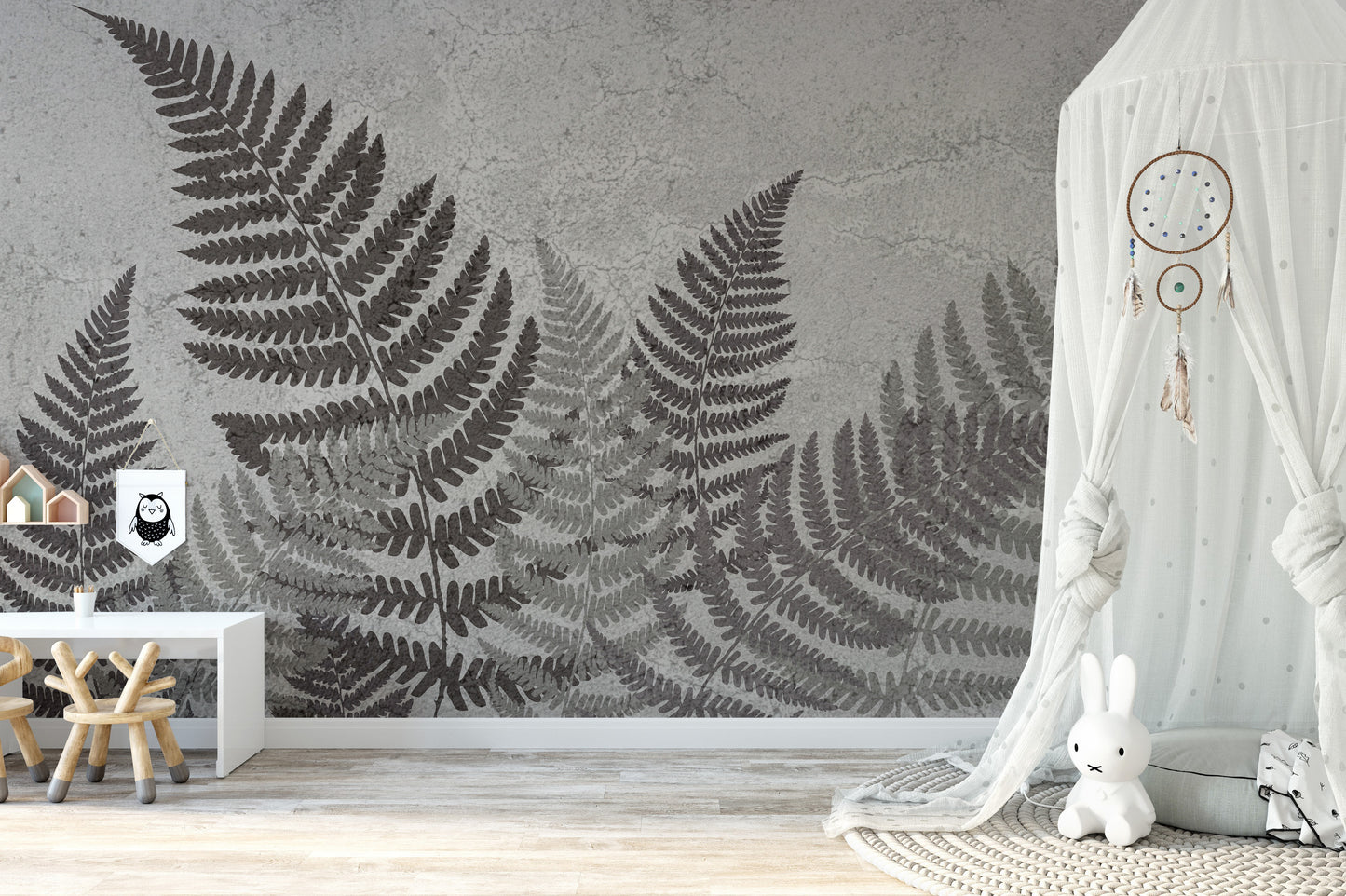 Artistic tropical fern mural adding a natural touch to walls.
