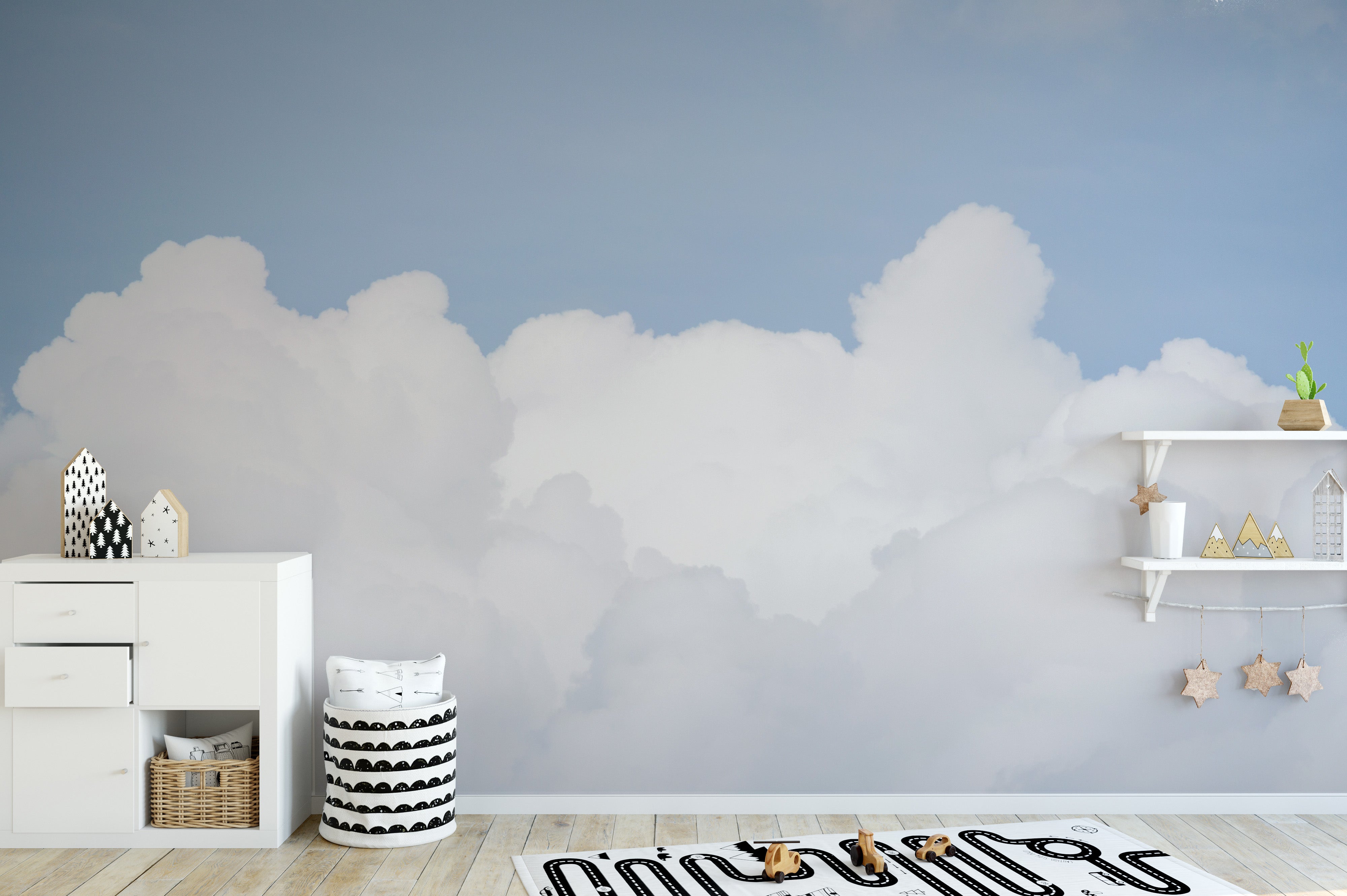 Minimalist sky wallpaper featuring puffy white clouds.