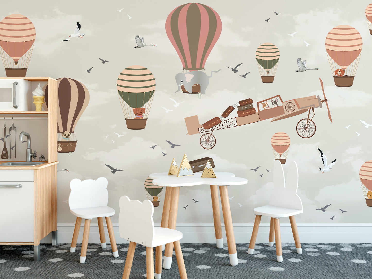 Whimsical hot air balloon wallpaper for kids' room decor.