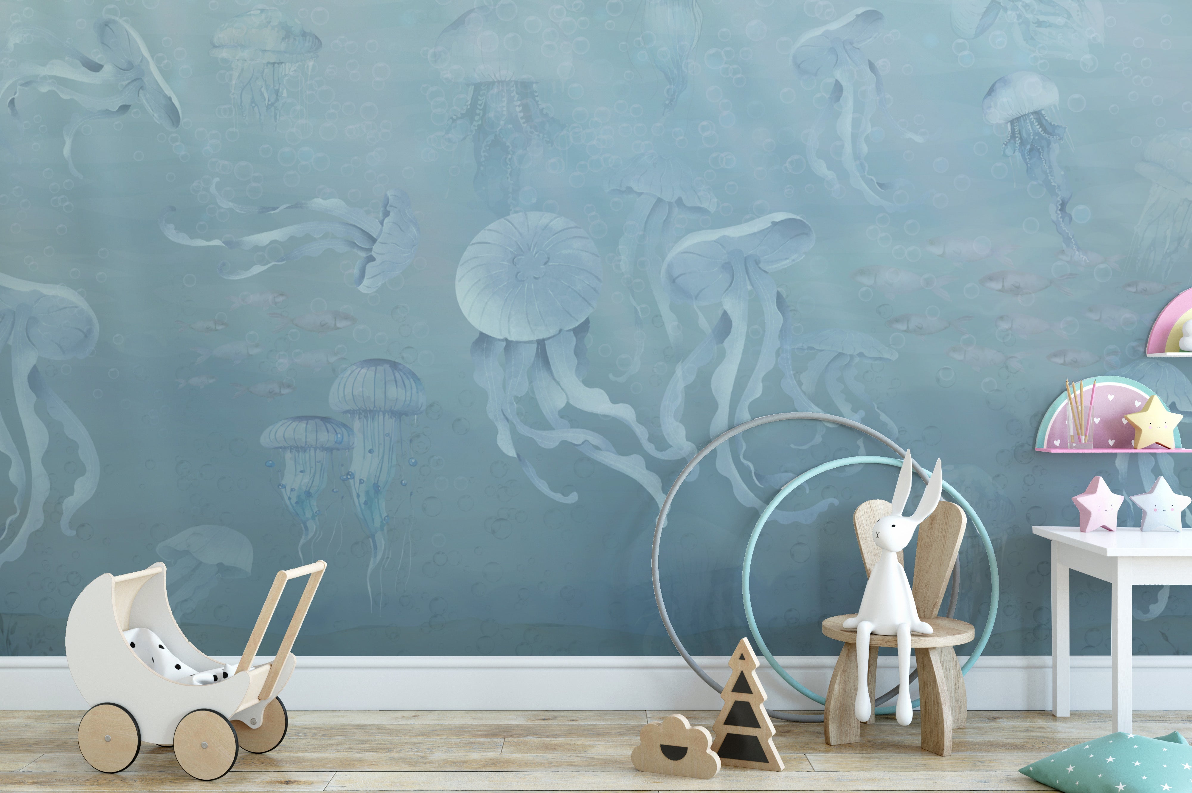 Floating jellyfish wallpaper mural in soft blue tones
